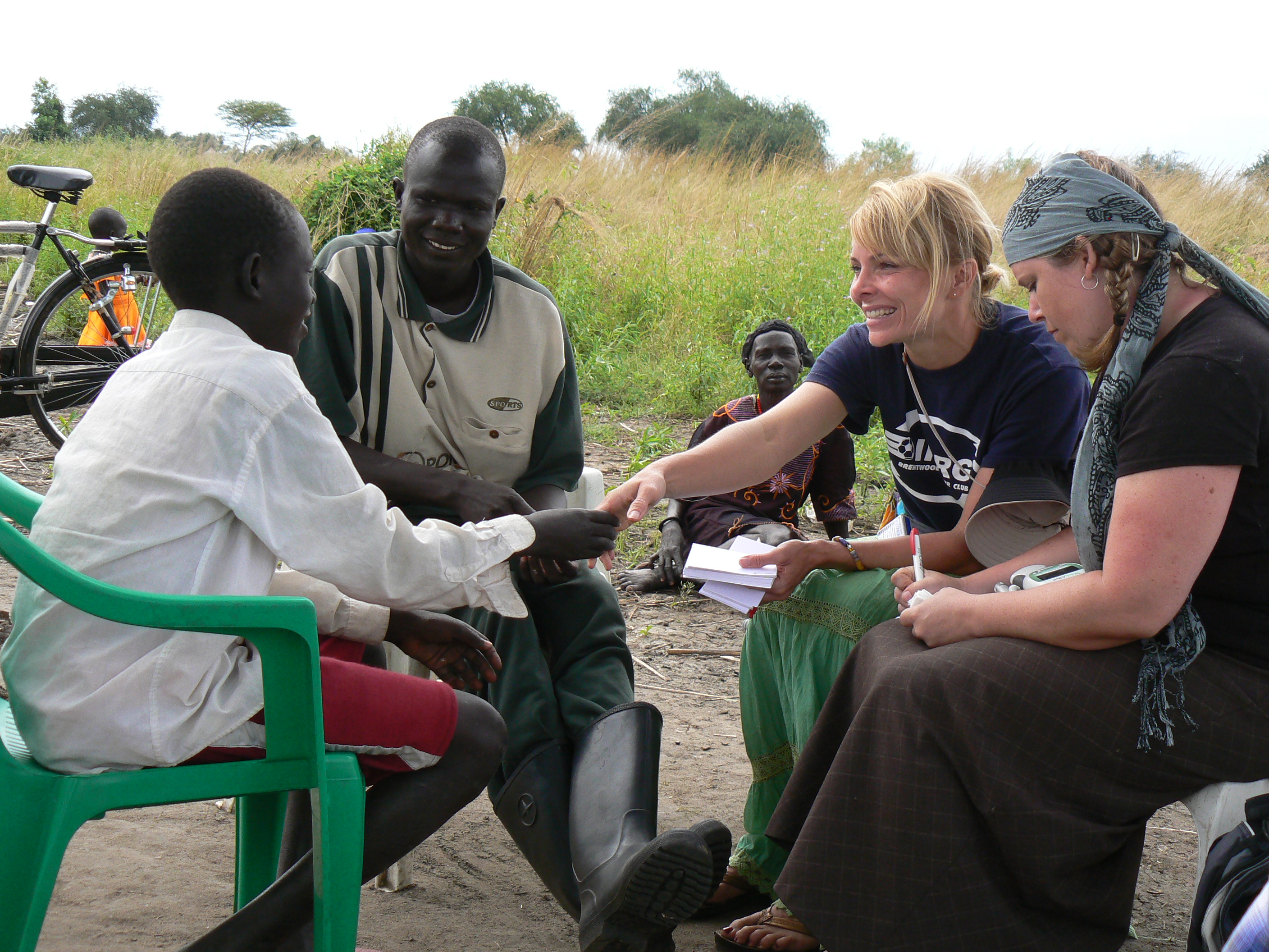 Volunteers mentoring and training community members